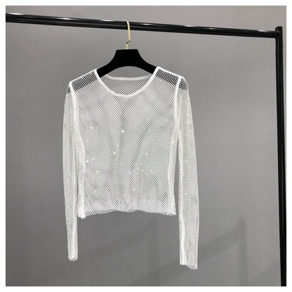 Versatile women's dazzling shiny long sleeve top, featuring rhinestone accents. Elegant for evening or party wear.