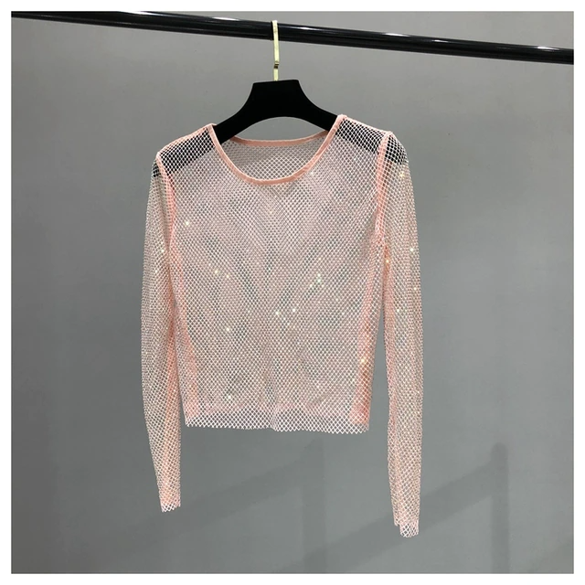 Glamorous women's shiny long sleeve top with dazzling rhinestone embellishments. Perfect for parties & evening events.
