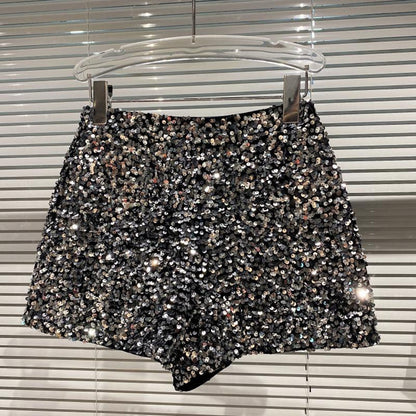 Women's dazzling sparkle bling shorts in black, perfect for party wear and a fashion statement. High-waist glitter shorts.