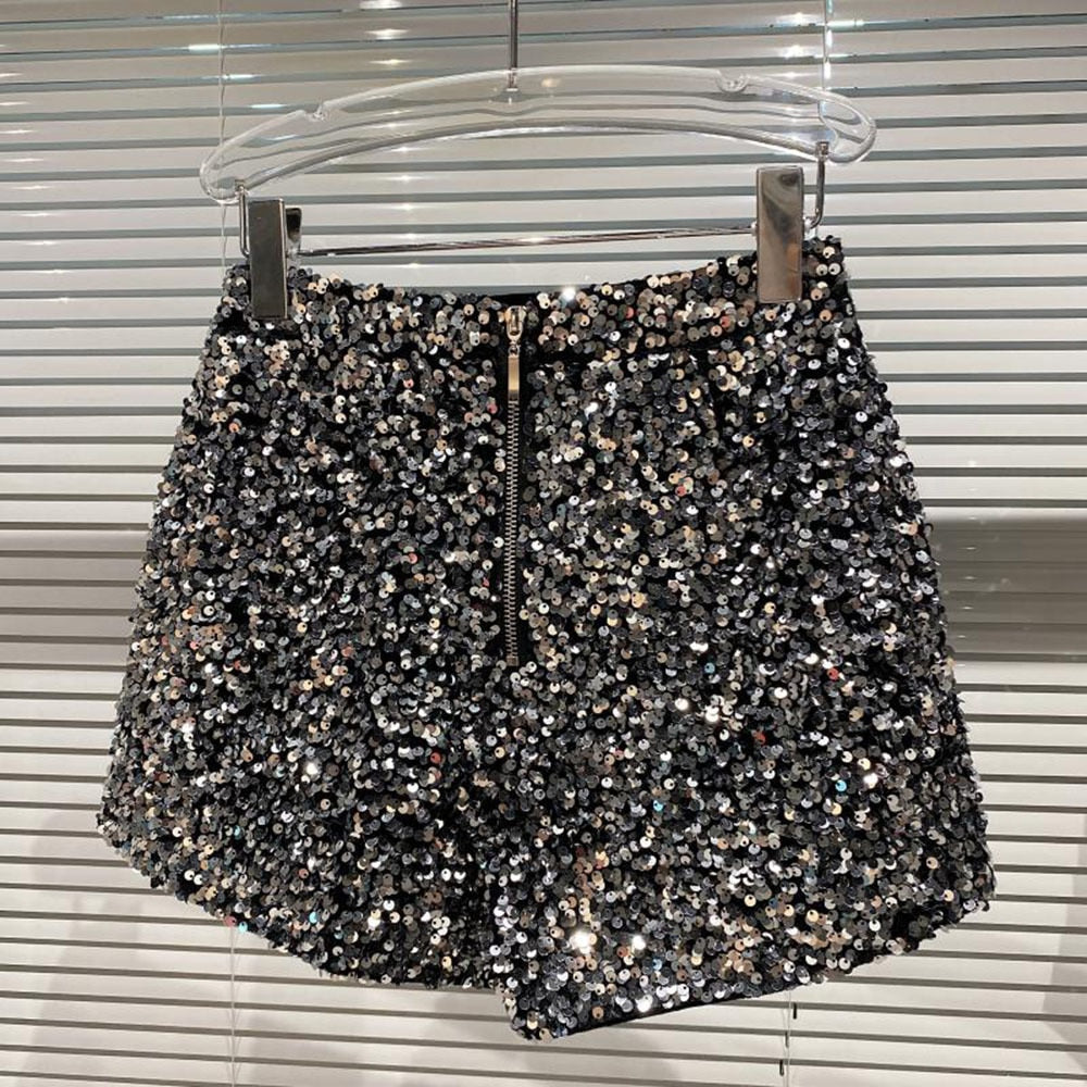 Trendy silver glitter high-waist women's shorts, offering a dazzling shine for parties & fashion. Bling apparel.