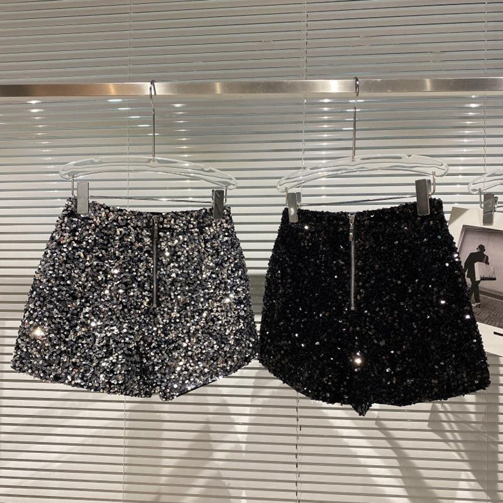 Fashionable women's party wear sparkle shorts. High-waist bling shorts in black, perfect for a dazzling look.