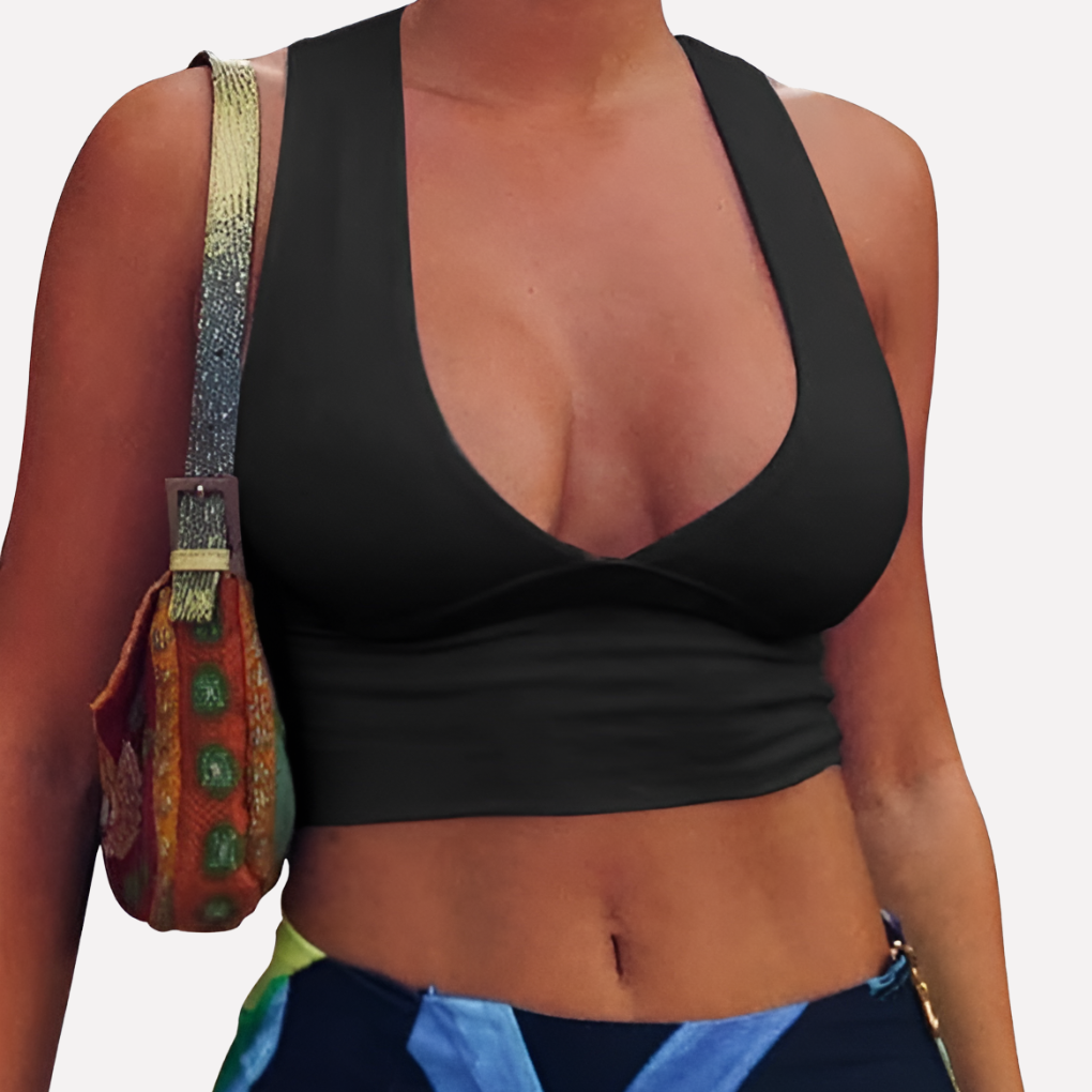 Trendy women's summer crop top with deep V-neck and racerback. Sleeveless casual wear, ideal for warm weather fashion.