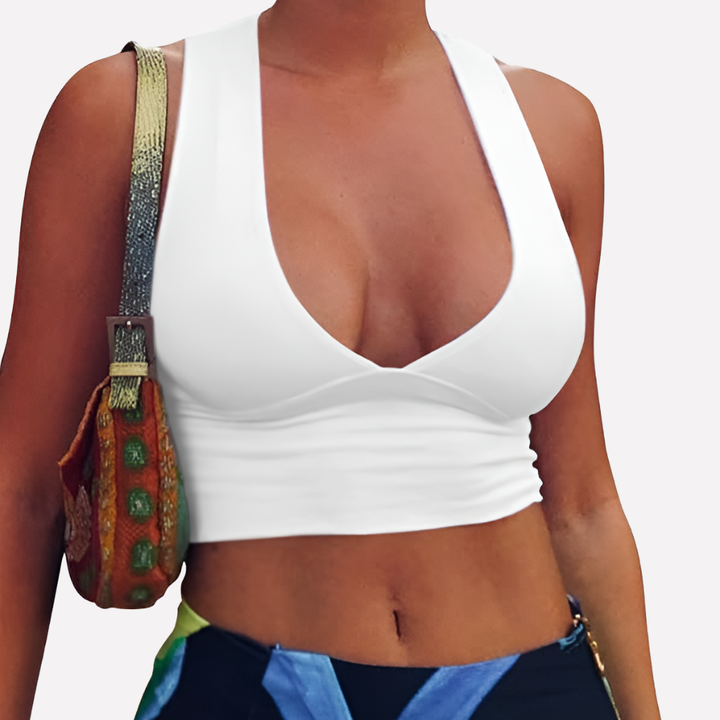 Fashionable women's deep V-neck crop top. Racerback sleeveless design offers comfort for summer activities & casual style.