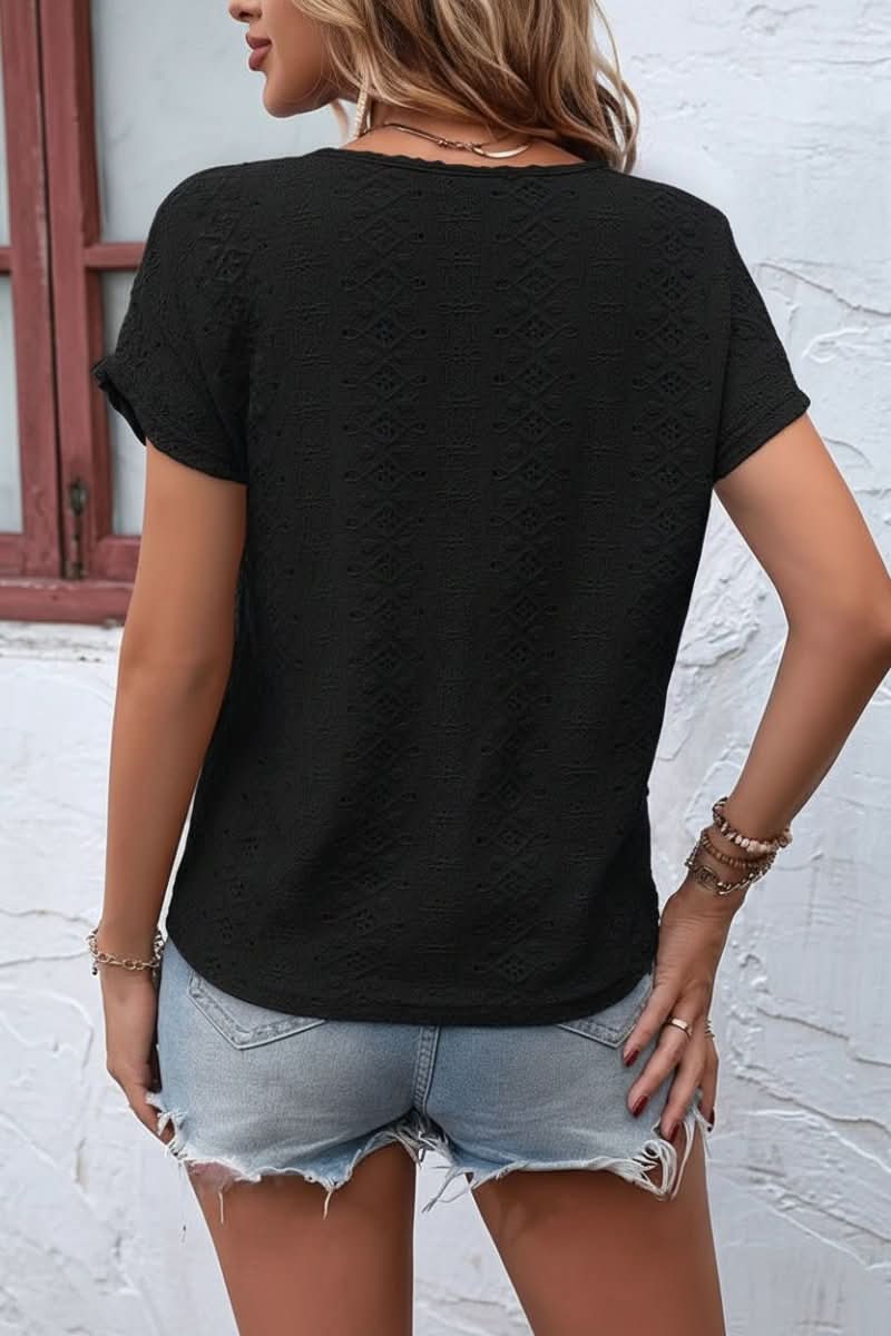 Versatile women's eyelet t-shirt, a comfortable summer fashion staple with a unique notched neck.