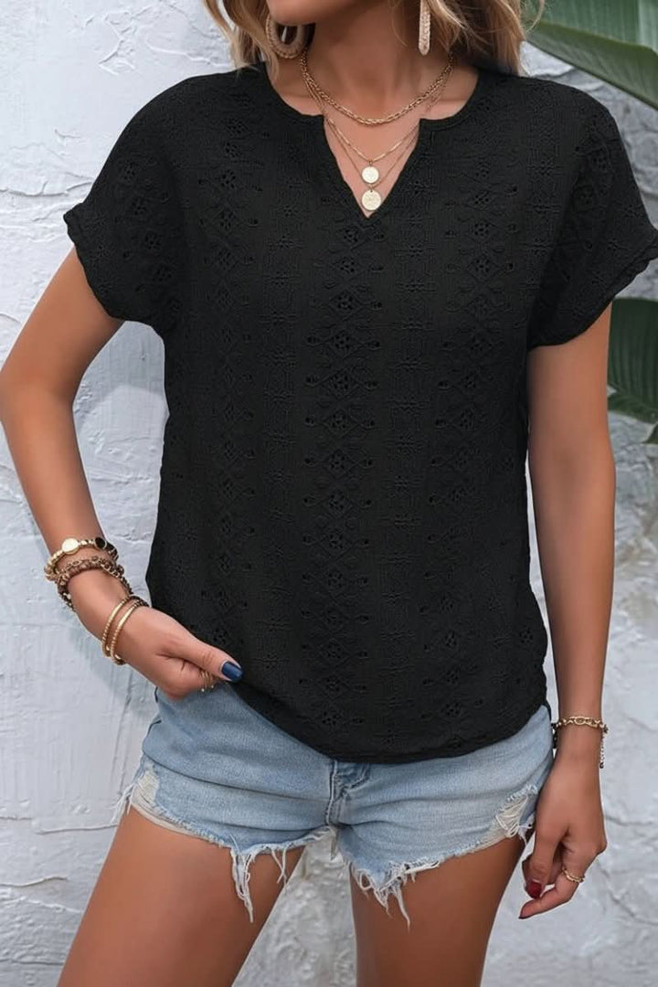 Chic short-sleeve women's eyelet t-shirt, offering a comfortable fit and a fashionable notched neckline.