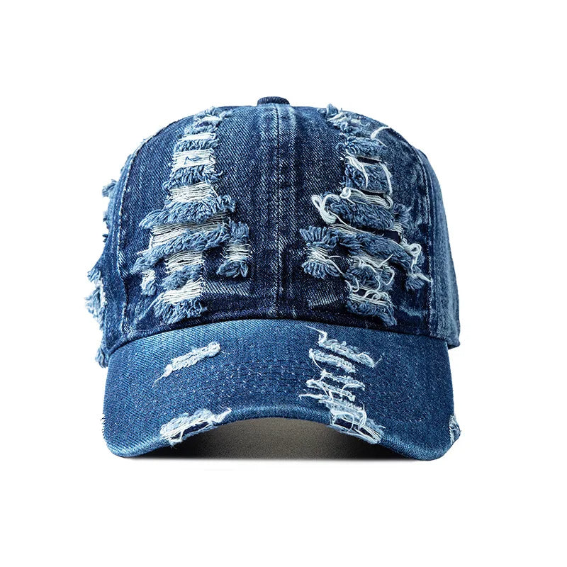 Adjustable women's distressed denim cap, ideal for a casual, comfortable streetwear look. Fashion accessory.