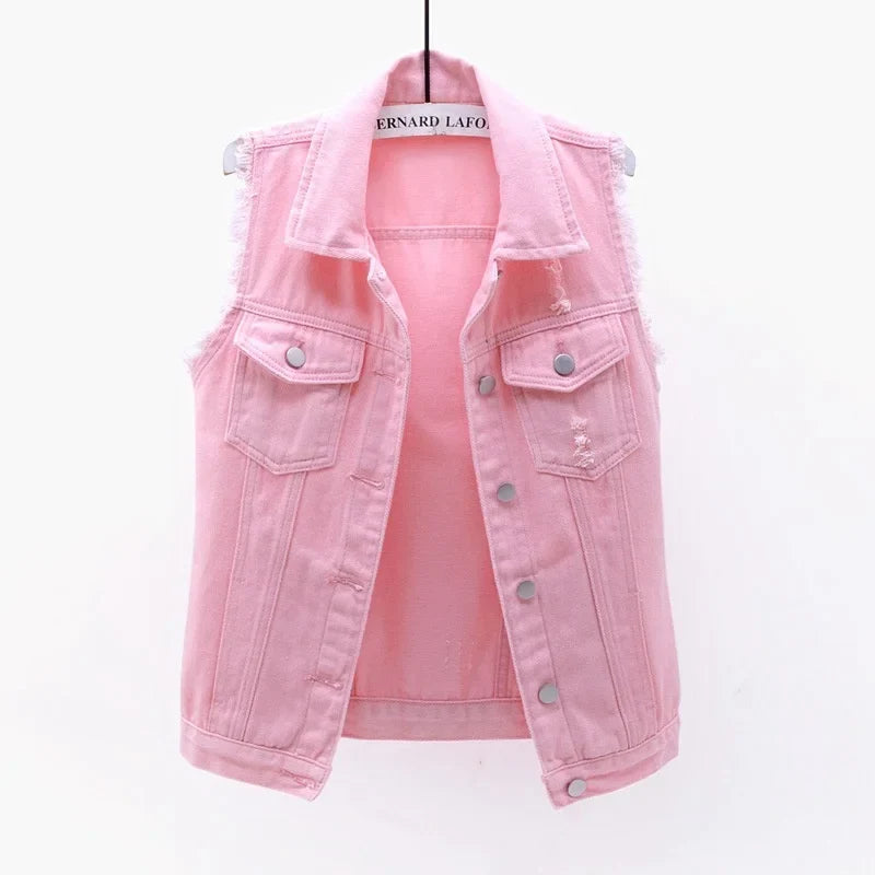 Women's distressed oversized denim vest for an edgy, casual streetwear look.