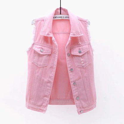 Women's distressed oversized denim vest for an edgy, casual streetwear look.