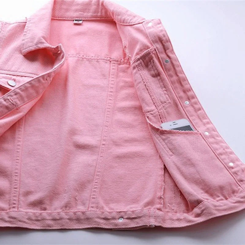 Stylish women's distressed denim vest, oversized fit, perfect for layering and streetwear fashion.