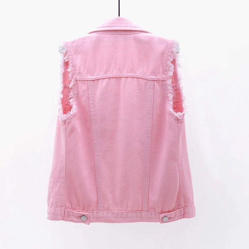 Casual women's distressed denim vest, oversized, sleeveless, ideal for layering and edgy outfits.