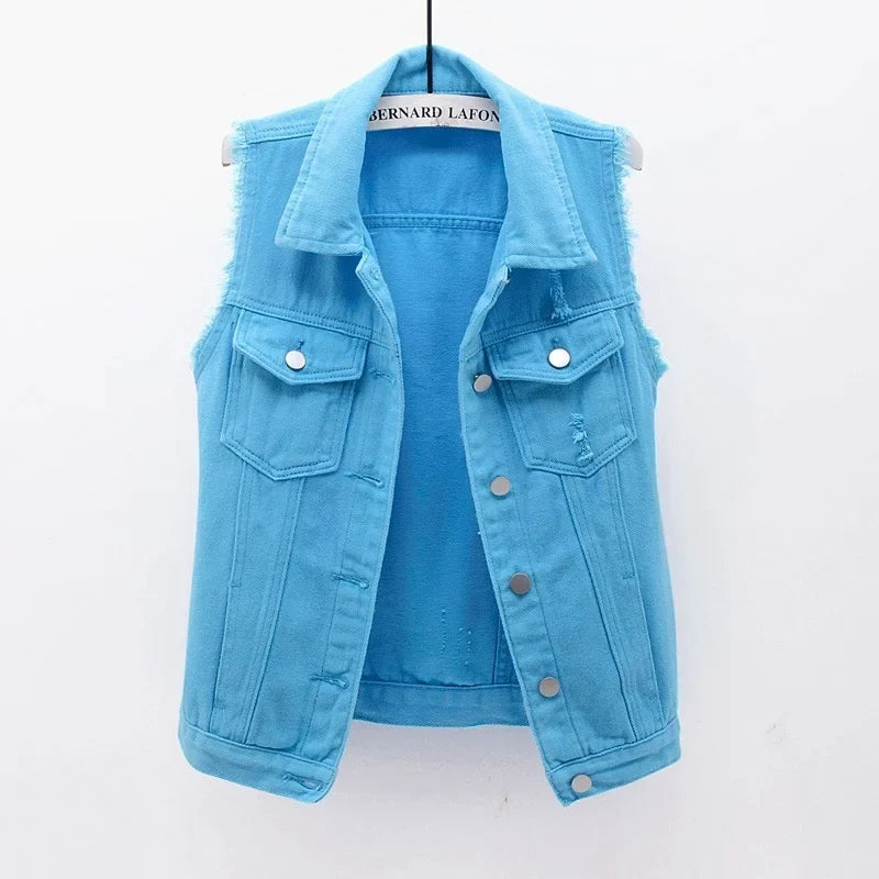 Fashionable women's oversized distressed denim vest, perfect for casual layering and urban style.