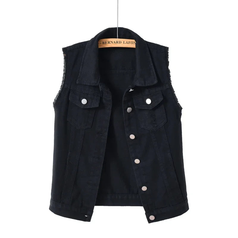 Trendy women's distressed oversized denim vest, essential denim outerwear for edgy casual looks.