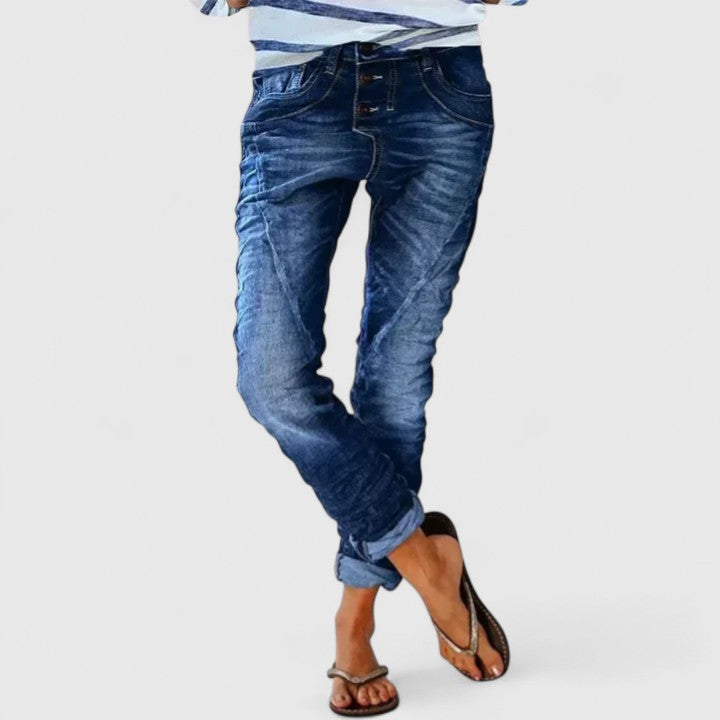 Women's vintage-style distressed wide-leg jeans, relaxed fit denim, essential for casual wear.
