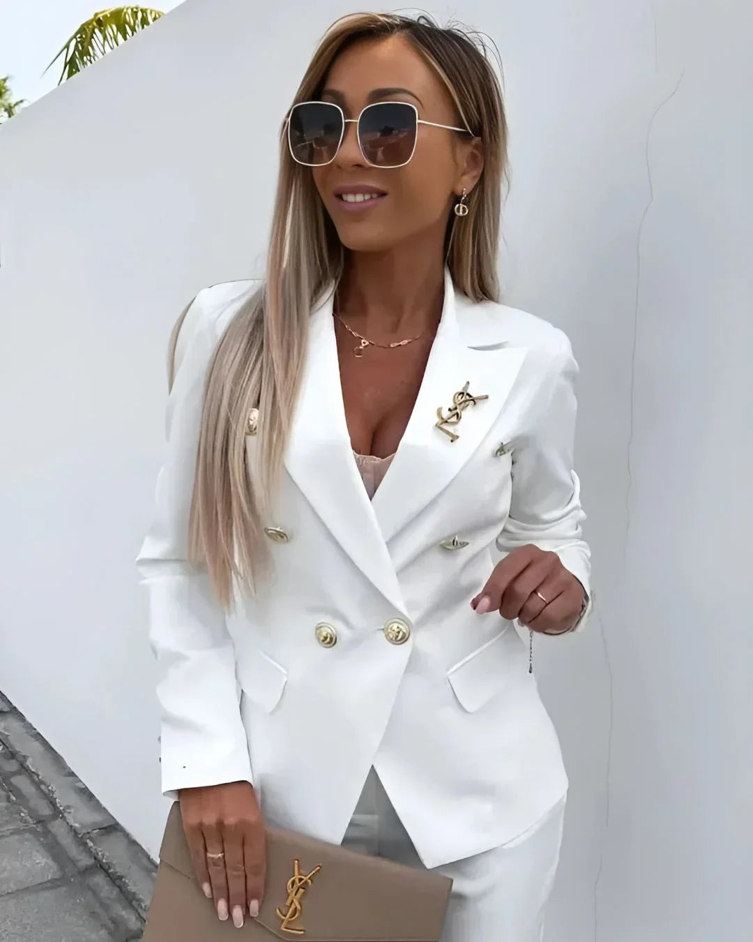 Versatile women's double-breasted tailored suit set. Blazer & trousers for office and formal events.