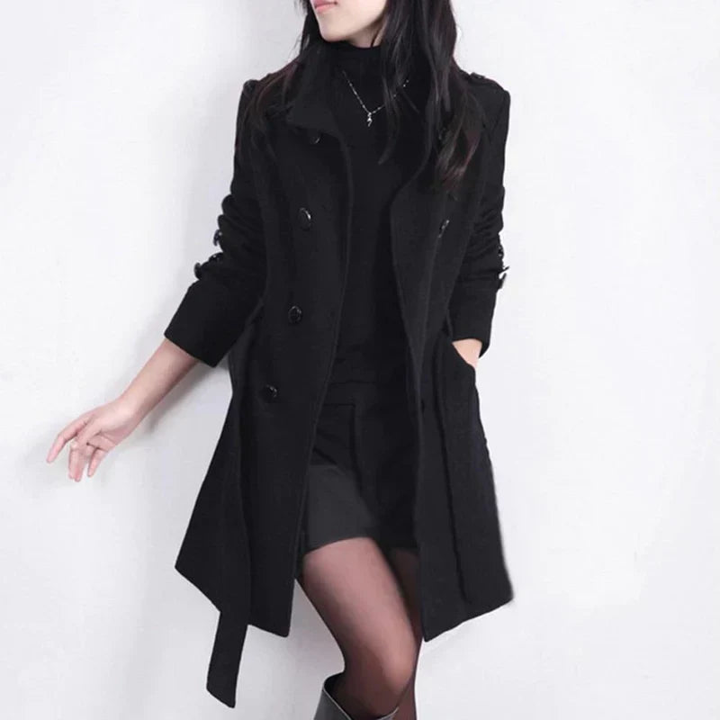 Women's double-breasted trench coat with a belted waist, perfect for business casual and stylish fall fashion.