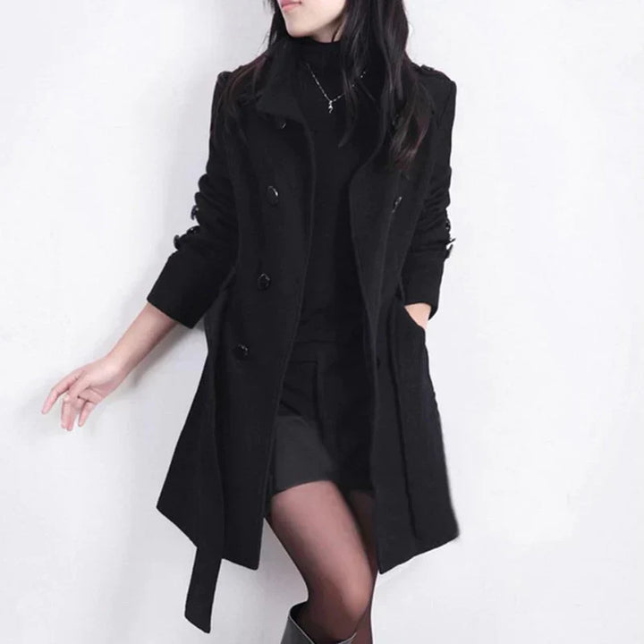 Women's double-breasted trench coat with a belted waist, perfect for business casual and stylish fall fashion.