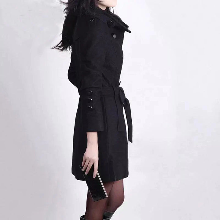 Chic women's trench coat, double-breasted design with a belted waist, ideal for elegant fall & winter outerwear.