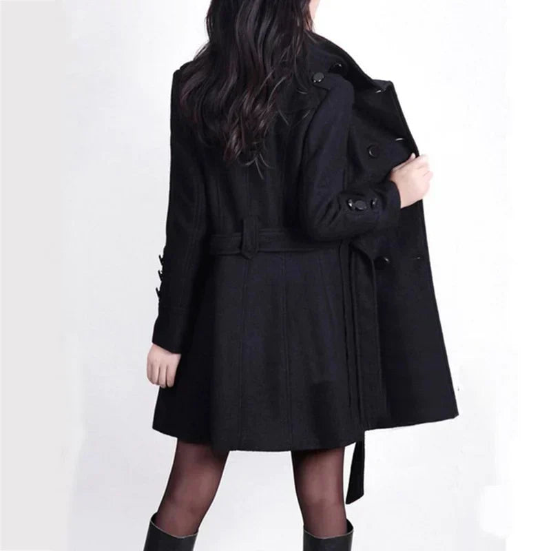 Stylish women's double-breasted trench coat with a belt, versatile for business casual looks and chic outerwear.
