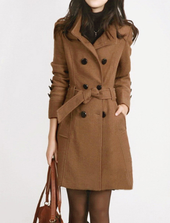Elegant women's double-breasted trench coat, featuring a classic design and belted waist for a sophisticated look.