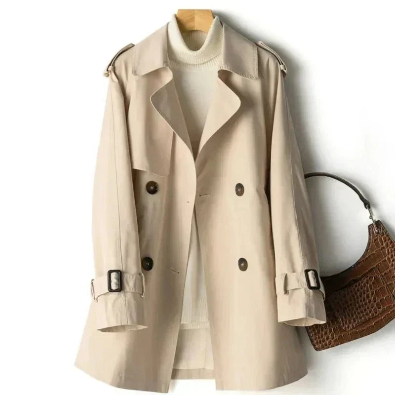 Women's double-breasted trench coat with belt & adjustable cuffs. Classic fall/spring outerwear, elegant office style.