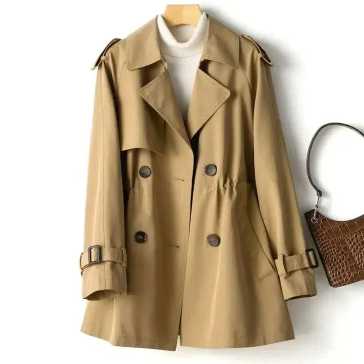 Versatile women's belted trench coat, perfect for fall or spring. Double-breasted classic long jacket style.