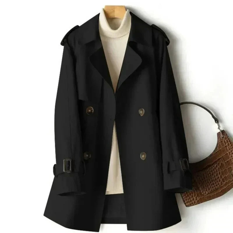 Women's long trench coat, double-breasted & belted for elegant office style. Versatile fall/spring outerwear.