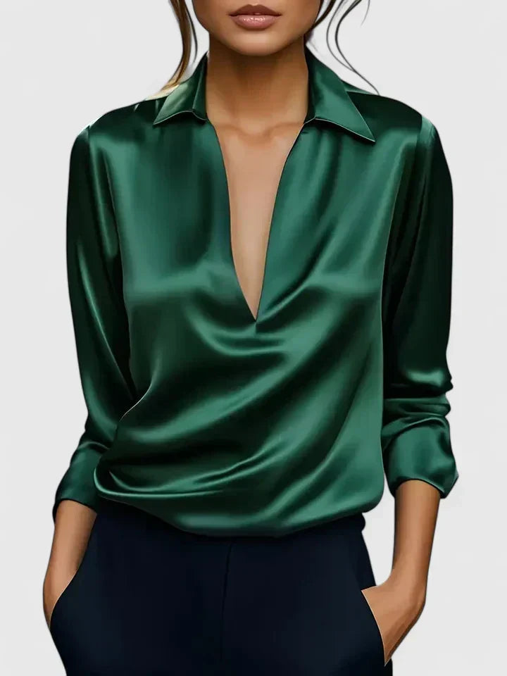 Elegant women's flowy V-neck blouse, long sleeve with beautiful drape. Ideal for sophisticated office wear.