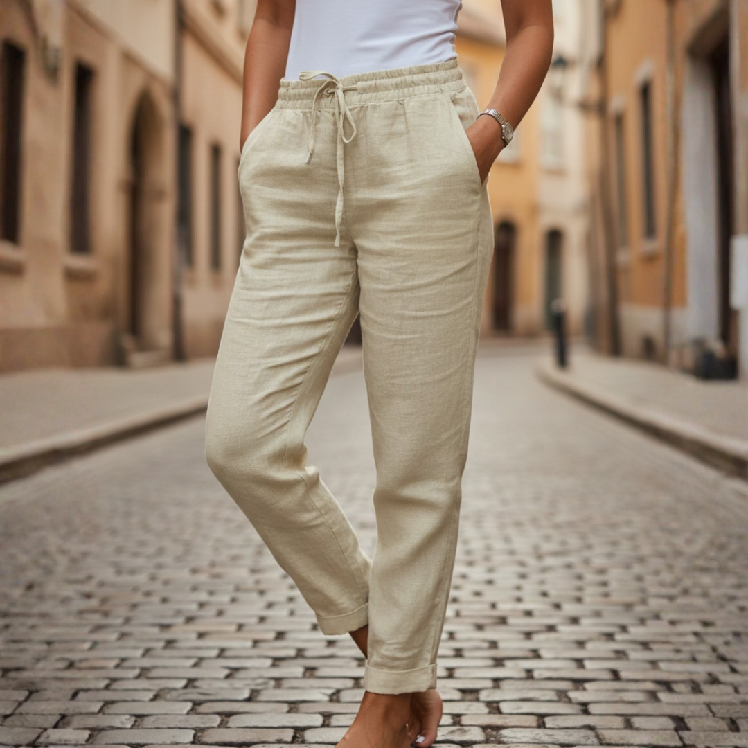 Stylish women's tapered drawstring pants for summer, featuring a cuffed hem for casual comfort & versatility.