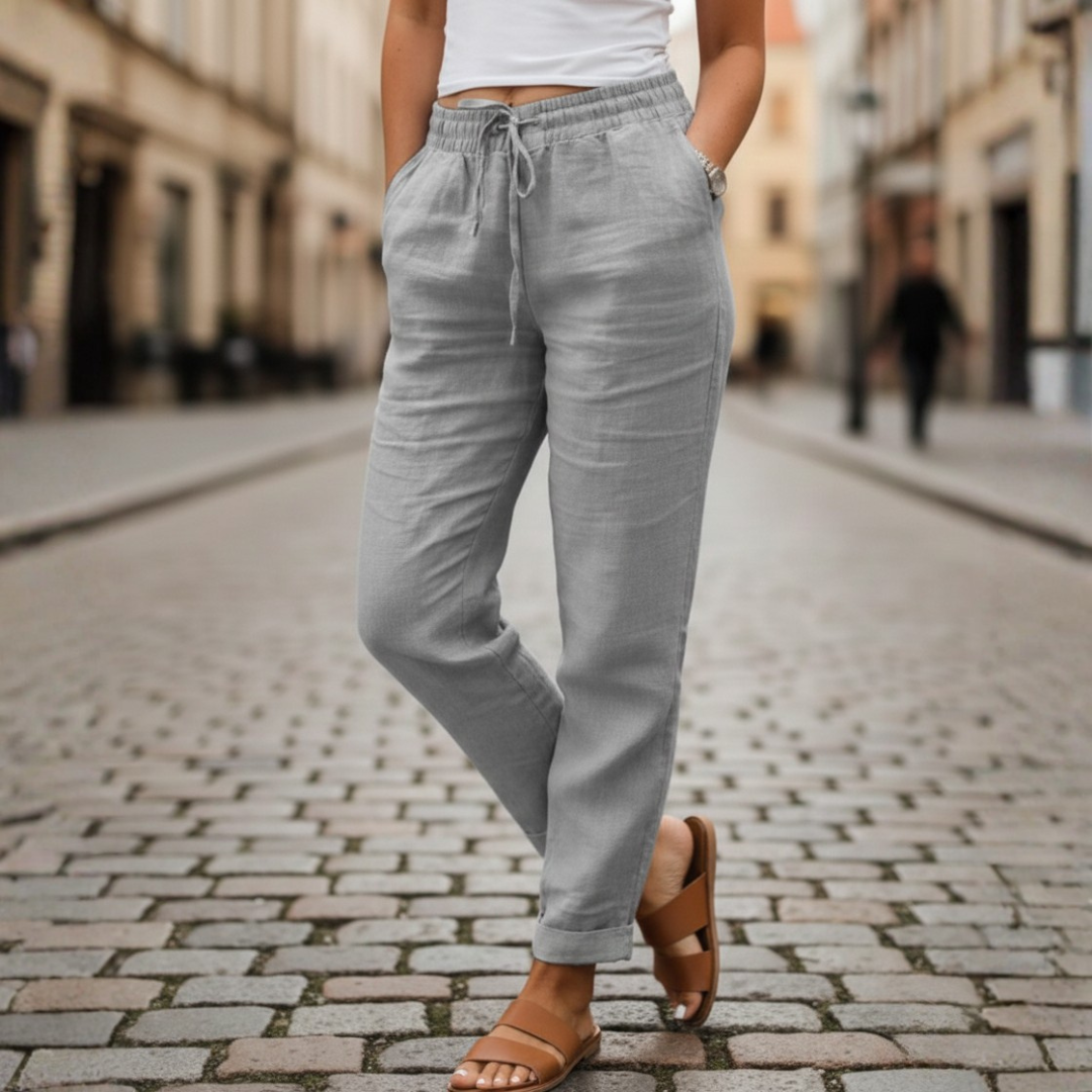 Fashionable women's drawstring tapered summer pants with an elastic waist for effortless, relaxed comfort.