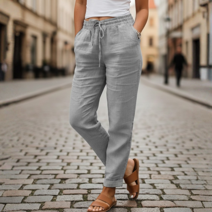 Fashionable women's drawstring tapered summer pants with an elastic waist for effortless, relaxed comfort.