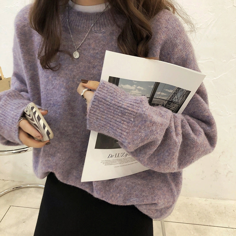 Cozy women's long sleeve drop shoulder sweater for comfortable everyday wear.