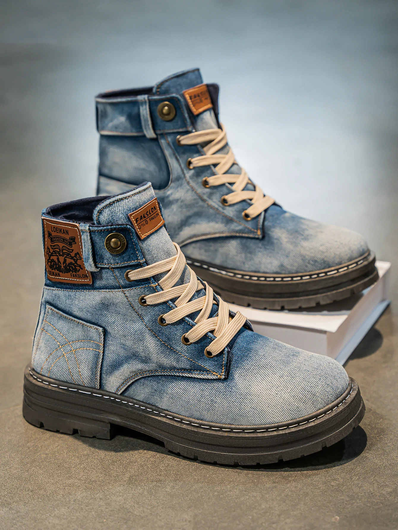Blue women's durable high-cut boots, anti-slip and comfortable. Ideal for street style and rugged casual wear.