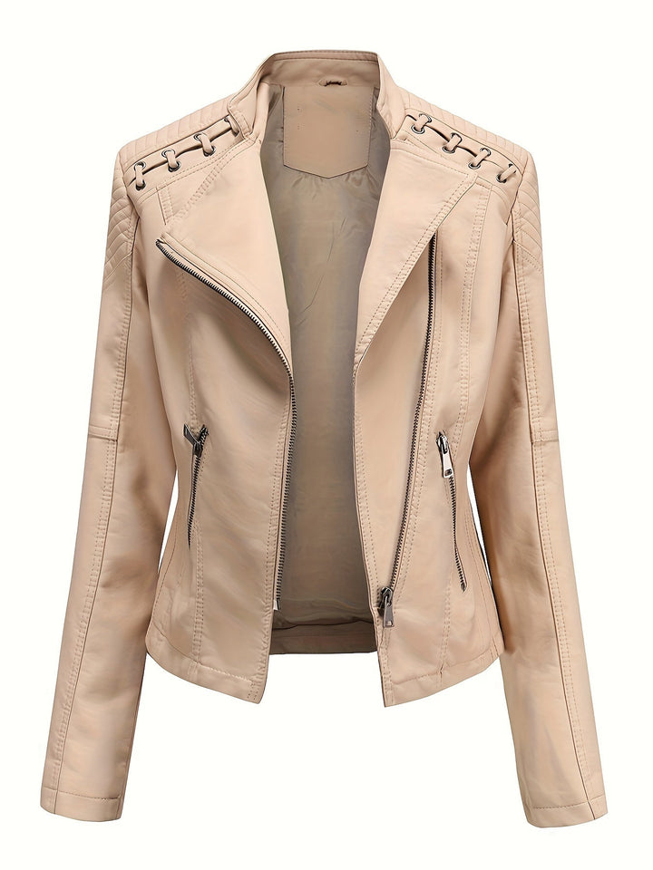 Close-up of women's edgy moto jacket, highlighting studded shoulders and the stylish asymmetric zip.