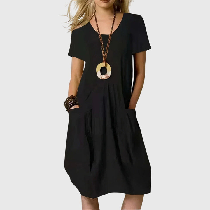 Comfortable women's A-line dress with pockets. Stylish everyday casual fashion for spring and summer.