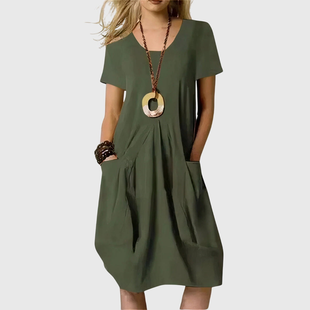 Versatile women's A-line casual dress, ideal for everyday wear. Features convenient pockets and a comfortable fit.
