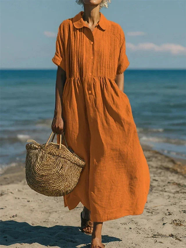Effortless women's casual midi dress, relaxed fit, button-down, ideal for comfortable spring and summer fashion.