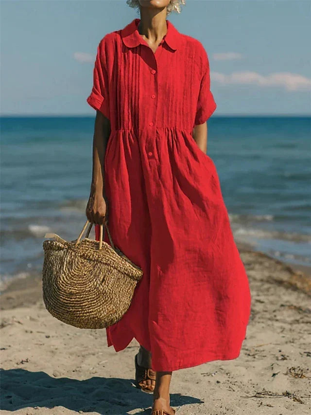Flowy women's casual midi dress, comfortable for everyday wear, button-down, great for relaxed spring/summer style.