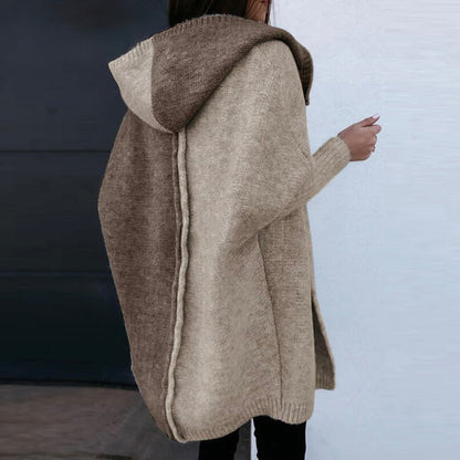 Women's effortless chic long oversized knit sweater for cozy winter style & comfortable everyday wear.