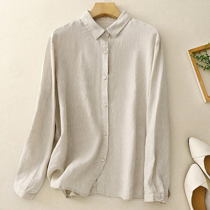 Casual blue women's long sleeve button-down. Relaxed fit top for comfortable everyday spring & summer style.