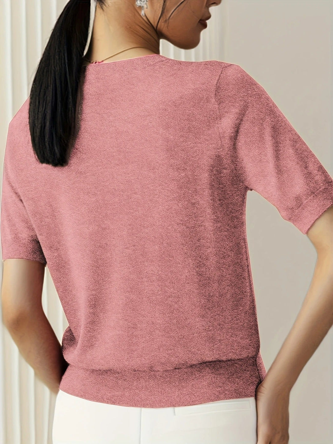 Relaxed women's short sleeve knit tee, crew neck design. An everyday basic with a fashion edge.