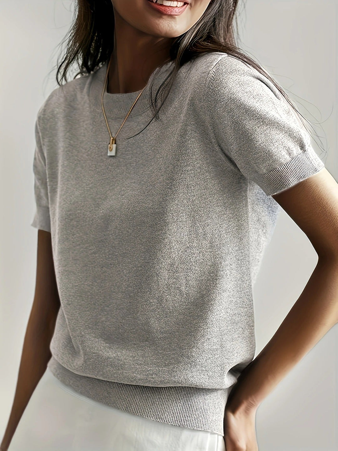 Effortless women's casual short sleeve knit tee. Crew neck, perfect for a versatile wardrobe.