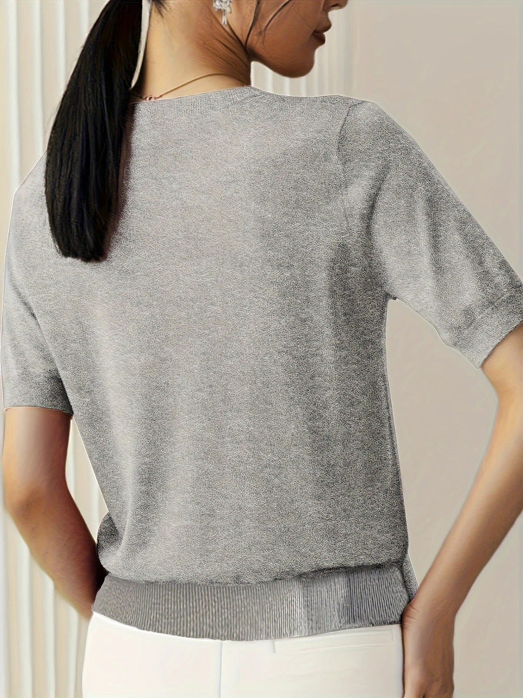 Stylish women's short sleeve crew neck knit tee. Ideal for a comfortable yet chic casual look.