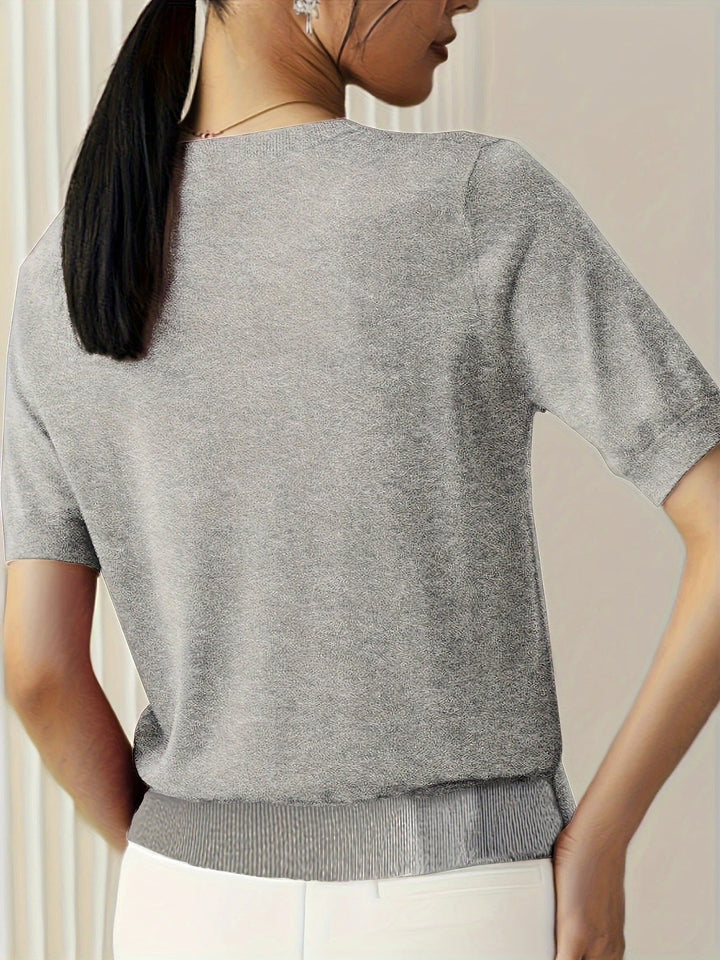Stylish women's short sleeve crew neck knit tee. Ideal for a comfortable yet chic casual look.