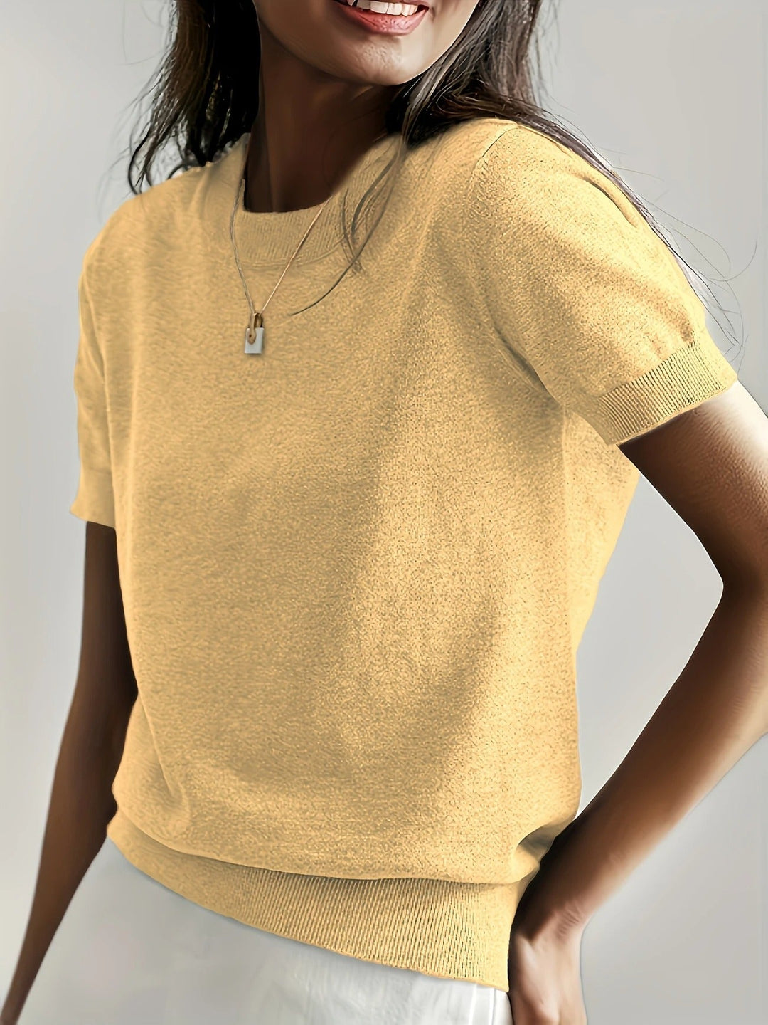Women's comfortable knit tee, short sleeve, crew neck. Essential basic for a relaxed, everyday feel.