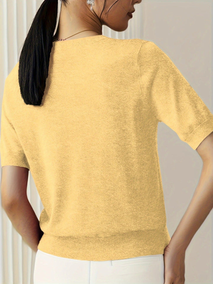 Casual women's short sleeve knit tee, crew neck design. A relaxed fit for laid-back style.