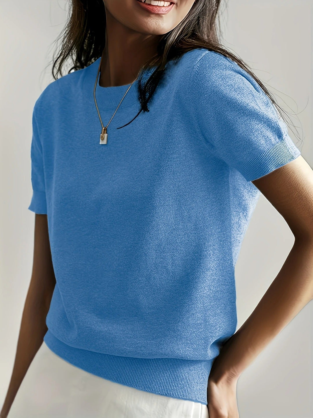 Women's basic crew neck short sleeve knit tee. An everyday essential with an elevated touch.