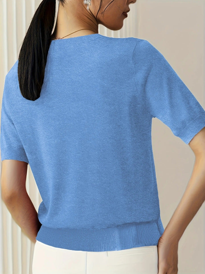 Effortless women's short sleeve crew neck knit tee. A versatile top for any casual occasion.