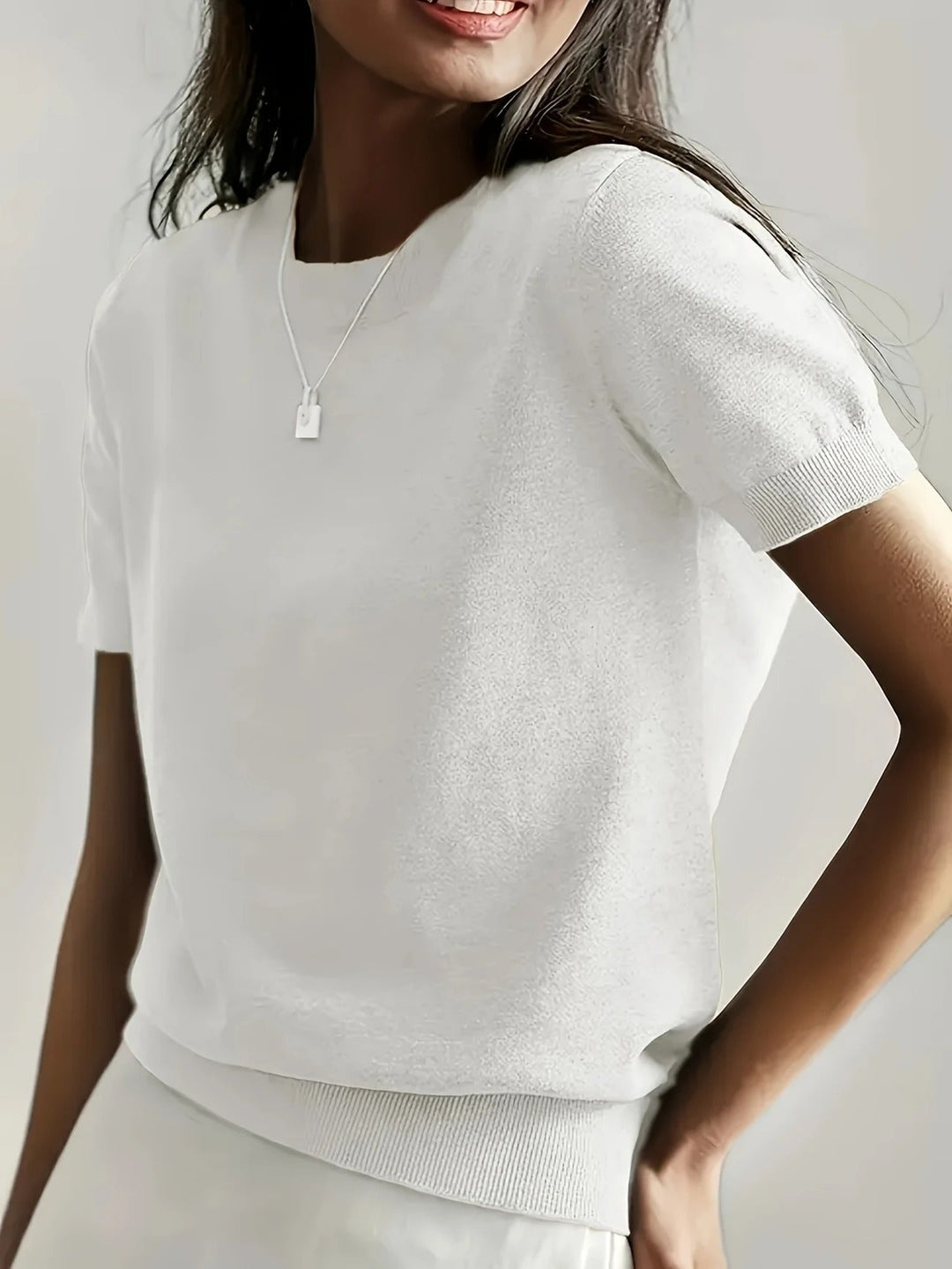 Fashion women's short sleeve knit tee, crew neck. Perfect for an elevated everyday wardrobe.