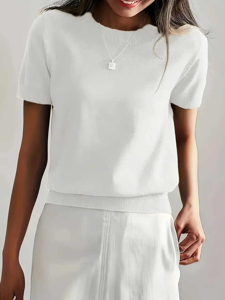 Women's relaxed fit crew neck short sleeve knit tee. A comfortable and versatile basic top.