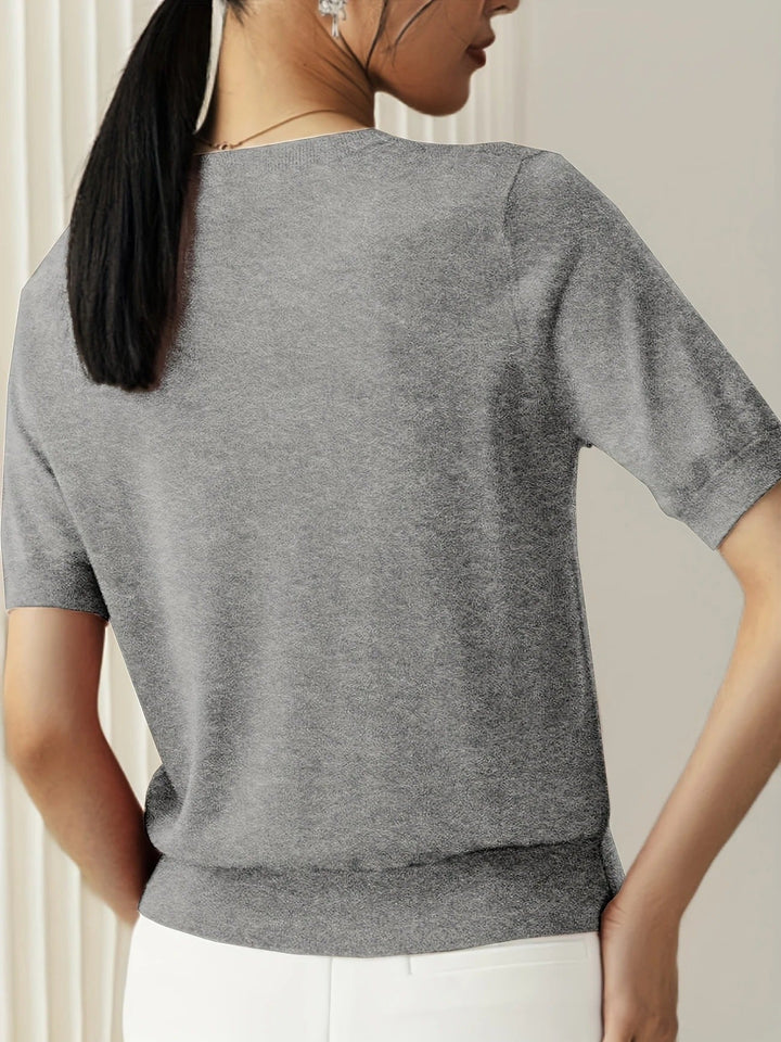 Relaxed fit women's knit tee with short sleeves and a classic crew neck. Perfect everyday top.